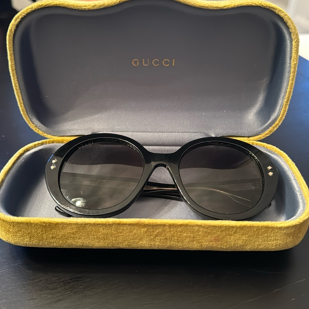 Like new Gucci Black Sunglasses included with velvet case.
